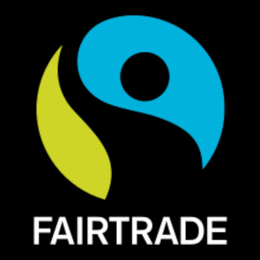 Fairtrade logo with a blue circle, yellow leaf, and black figure on a black background.